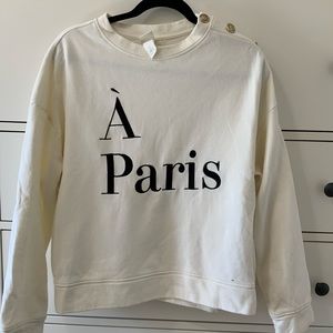 H&M sweatshirt. Size small with accent buttons along top shoulder.
